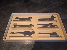 Suite de 6 portes-couteaux /