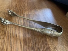 Ancienne Pince à sucre aux Pates de Lion