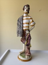 Ancienne Statuette figurine pêcheur en céramique avec Poisson Italie