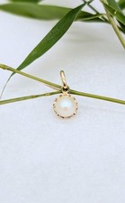 Pendentif support fleur en or orné d'une perle de culture blanche Or 750 Milliè