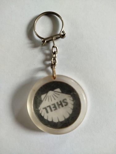 Porte clef shell signe - porte,