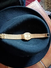 Montre en or 18k homme LONGINES, bracelet or massif + de 60 gr parfait état.