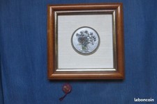 Cadre fleuri en étain du