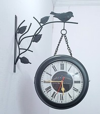 Horloge murale double face