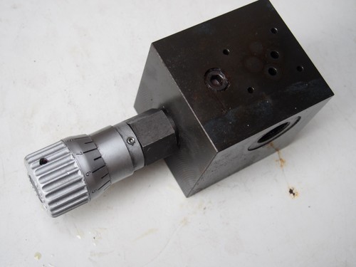 Limiteur pression - b),