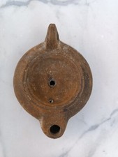Ancienne lampe à huile en terre cuite