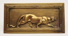 Plaque en bronze d’une panthère Art Deco en bas relief - Signée Louis Carvin
