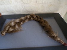 Longue tresse cheveux naturel