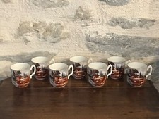 Série de 7 tasses à moka en porcelaine fine, décor paysage