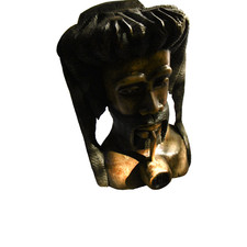 grosse tete africaine avec pipe sculptee en bois