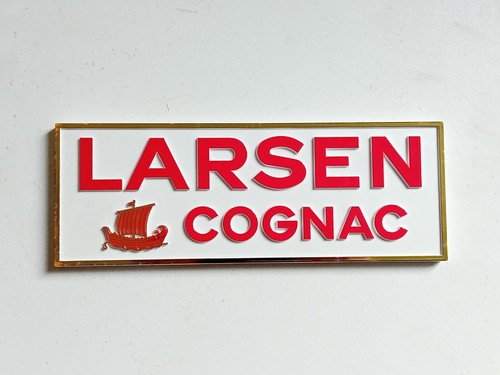 Ancienne plaque publicitaire