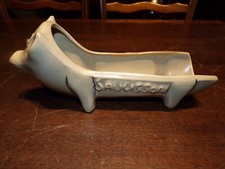 Plat à saucisson en forme de