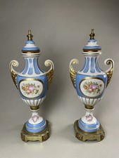 Pair of Sevres Blue Urns