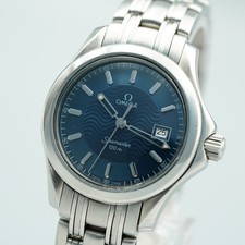 *PRESQUE COMME NEUVE* Montre