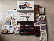 Gros lot master system 2 + phaser + 29 jeux SEGA