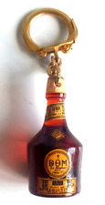 Ancien PORTE CLE BOUTEILLE Liqueur Bénédictine DOM