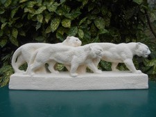 Ancienne statue groupe lionnes