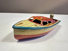 Jouet ancien en étain bateau à moteur Marusan, longueur totale 19 cm