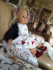 Poupée , Zapf Creation, corps souple, 55 cms, en très bon état .
