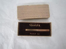 EPINGLE FIXE PINCE  A CRAVATE PLAQUE OR GOLDIA DANS SA BOITE D ORIGINE