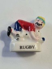 (E) Fève rugby 