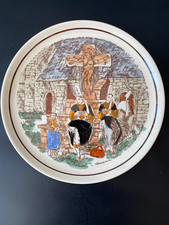 Assiette décor signé Henri