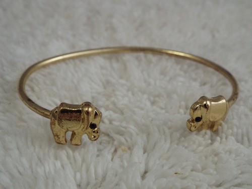 Goldtone elephant tipped - elephant, cuff