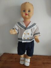 Poupon baigneur ancien en plastique yeux fixes TBE habillé