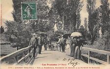 CPA 65 LOURES SUR LA PASSERELLE ( ATTELAGE A CHIENS