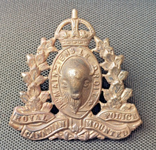 RCMP  cap badge . royal