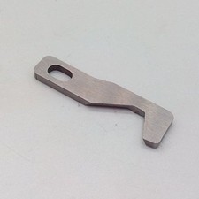 Couteau supérieur surjeteuse