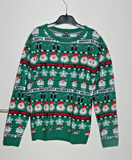 Pull Noël coloris vert imprimé père noël marque Kiabi taille 12 ans