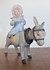Figurine porcelaine biscuit jeune fille sur âne tête articulé d'époque 19ème Nap
