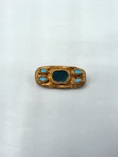 Bijou fantaisie broche en bronze doré et émaux colorés signée Willy XXème 