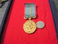 medaille    UNIVERSALIS