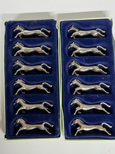 Lot de 12 porte-couteaux en forme de cheval métal chromé
