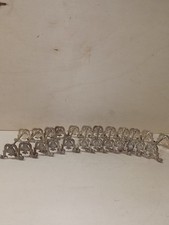 Lot de 12 portes couteaux Début XX Ème en métal argenté Roux Marquiand