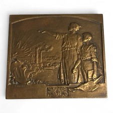 Médaille en bronze signée
