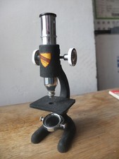 Microscope ancien Optico Paris avec manuel et boite de plaques .