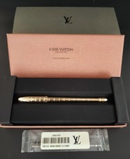 stylo à bille Louis Vuitton Stylo Agenda doré jamais utilisé avec boîte et re...