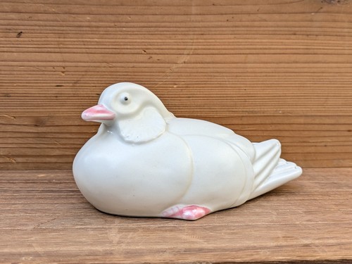 Une pigeon huppé céramique - pigeon,