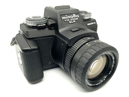 Minolta 110 zoom - zoom, avec