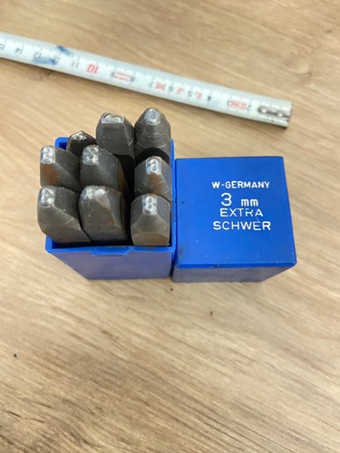 Boite chiffres frapper - de,