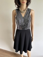 Robe noire et argentée neuve