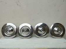 4 enjoliveurs Peugeot 504