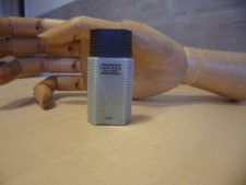 Miniature Parfum  Ted Lapidus " Lapidus "  Entamé  4 ML sans  boite