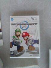 JEU WII MARIO KART + VOLANT  + MANETTE .