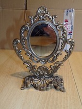 Ancien petit miroir pivotant en laiton ou bronze ( 18,5 cm haut 14,5 cm large )