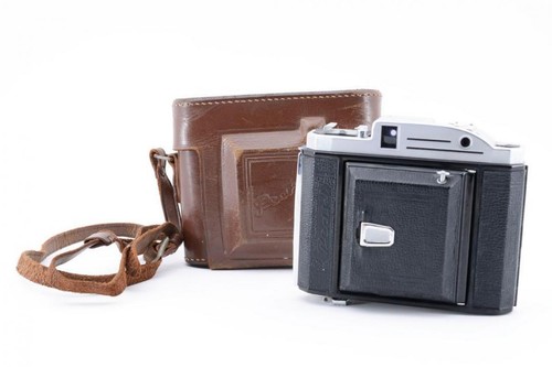 Near mint case konica - mint, w/case]