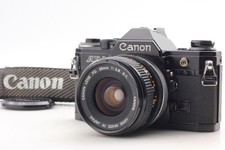 [N COMME NEUF] Appareil photo reflex argentique 35 mm Canon AE-1 objectif lar...